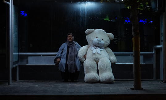 Woman at bus stop