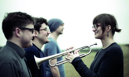 dinosaur band, Laura Jurd holding trumpet