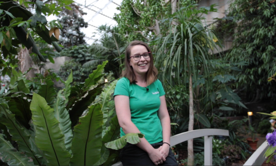 photo of marta lowcewicz laughing in the conservatory