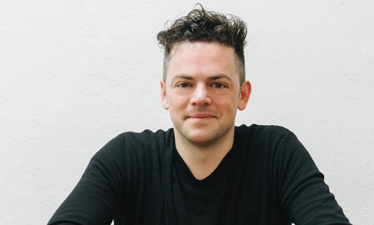 A portrait of Nico Muhly