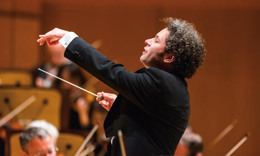 Gustavo conducting with great vigour