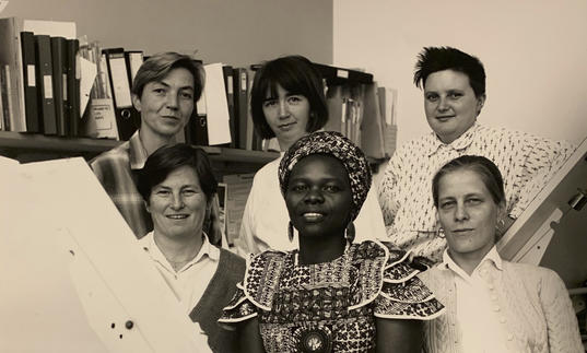 A sepia photograph of a group of six members of Matrix