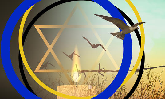 A candle burns in the centre of the image, with the star of David above it. Barbed wire runs across the photo, and a bird flies out of the right hand side of the image. The image has BBC SO branding around it.