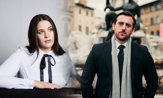 Lise Davidsen is sitting with her arm resting on a table on the left hand side of the image, Freddie De Tommaso stands in front of a fountain in coat and scarf on the right