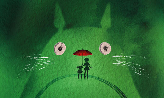 An illustration of the Totoro character with green watercolour washes of paint. Inside Totoro's face is the silhouette of two small characters holding a red umbrella.