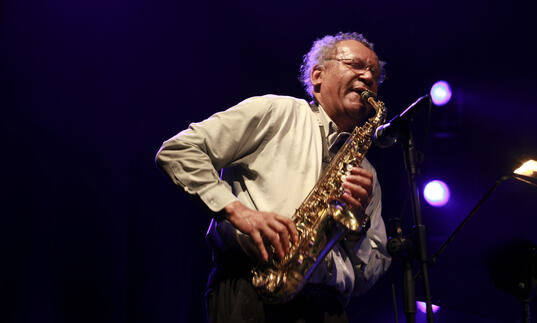 Anthony Braxton playing saxophone on stage 