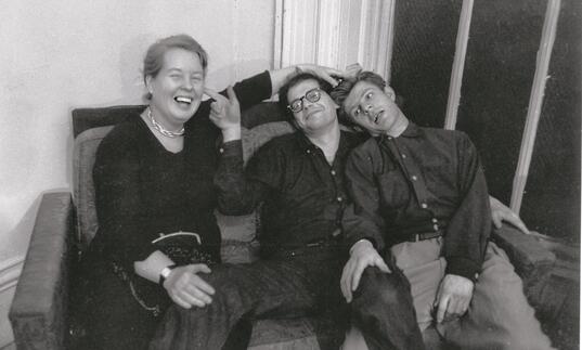 black and white photo of Alice Neel, Allen Ginsberg and Gregory Corso during the making of the film Pull My Daisy by Robert Frank and Alfred Leslie, 1959. Photograph by John Cohen. 