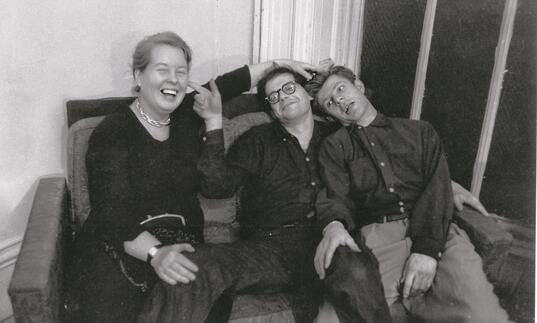 black and white photo of Alice Neel, Allen Ginsberg and Gregory Corso during the making of the film Pull My Daisy by Robert Frank and Alfred Leslie, 1959. Photograph by John Cohen.