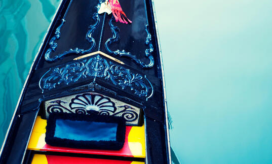 Close up photo of a gondola on the water