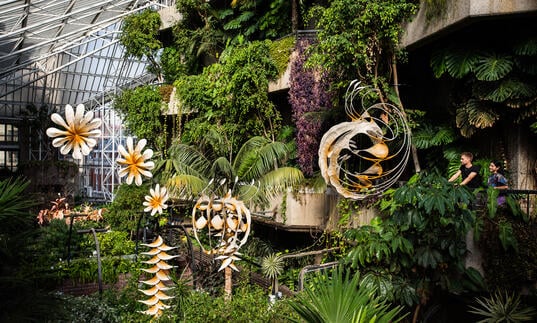 sculptures hang from the ceiling of the Conservatory