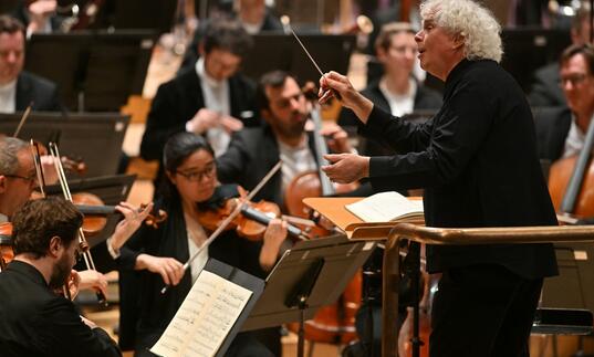 Sir Simon Rattle conducting the LSO