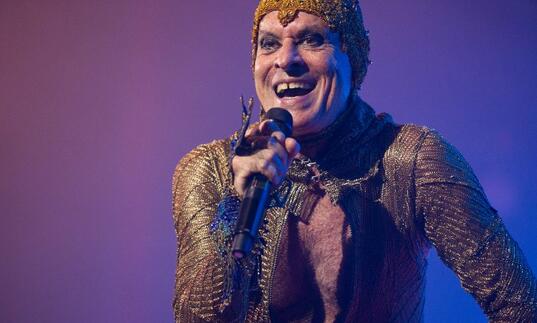 Ney Matogrosso onstage in a sequined catsuit
