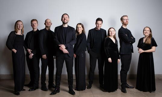 Marian Consort dressed in black