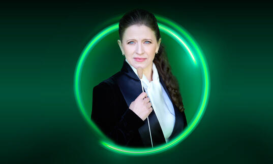 An image of Kristiina Poska surrounded bya green circle against a green background