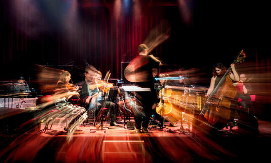A blurred picture of a classical ensemble on stage