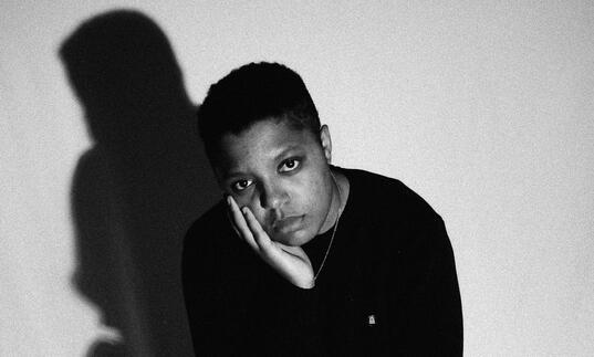 Black and white photo of Loraine James