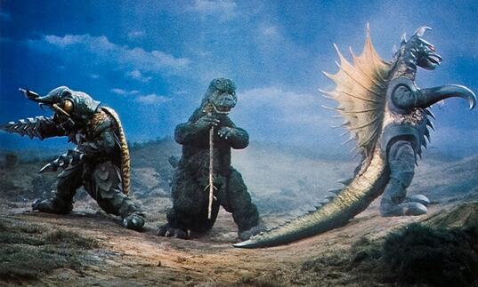 Godzilla, Megalon and Gigan standing in a row