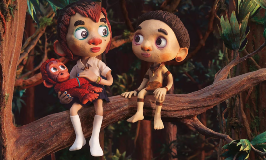 Two young people sit on a tree branch with an orangutang