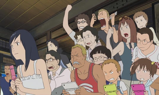 A young girl and a crowd behind her cheering