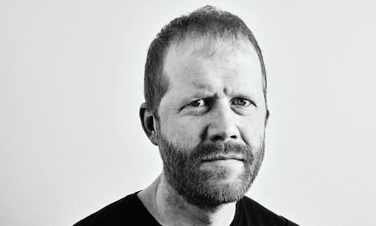 Black and white portrait of Andreas Malm