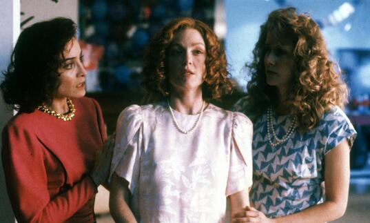 Three women standing together