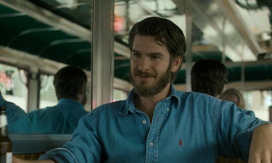 A man sitting on a bus