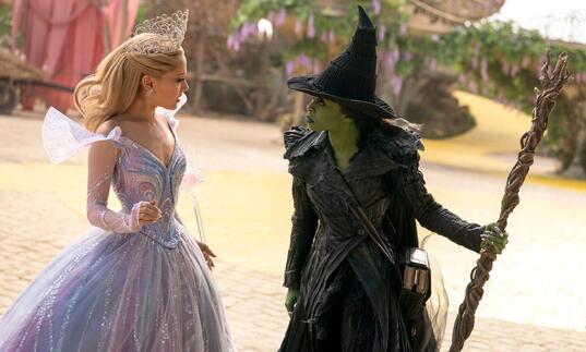 Glinda and Elphaba face each other