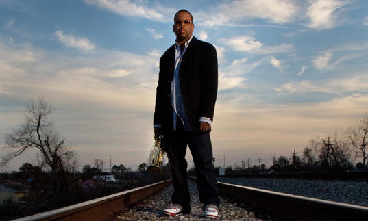 Terence Blanchard standing on train tracks - watch out, Terence!