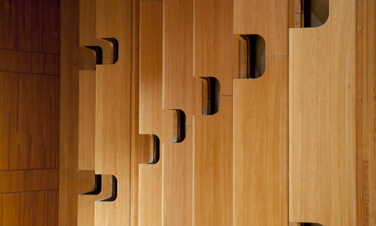 Photo of wooden paneling inside the Barbican Concert Hall