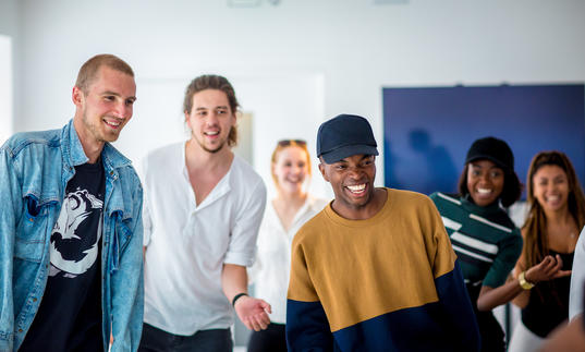 A group dancing in a workshop