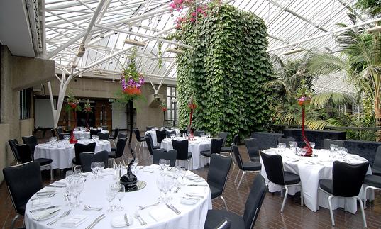 Photo of the Barbican Conservatory Terrace laid out with tables