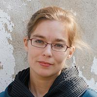 Photo of Žibuoklé Martinaityté looking at the camera